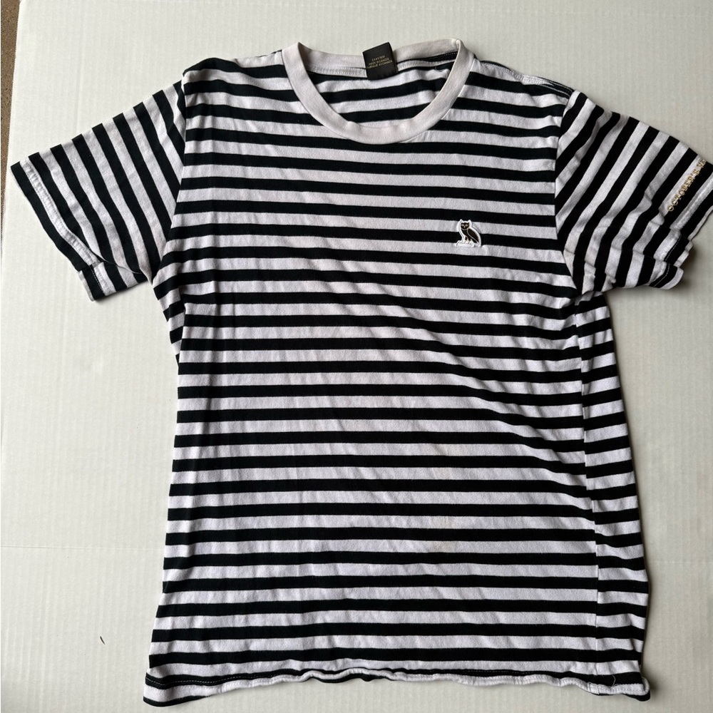 October’s Very Own OVO Men’s Owl Logo Black and White Striped Tshirt